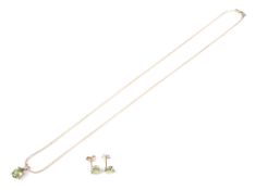A 9ct gold and peridot pendant and chain and a pair of stud earrings.