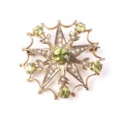 An early 20th century gold, peridot and half-pearl floral star brooch.