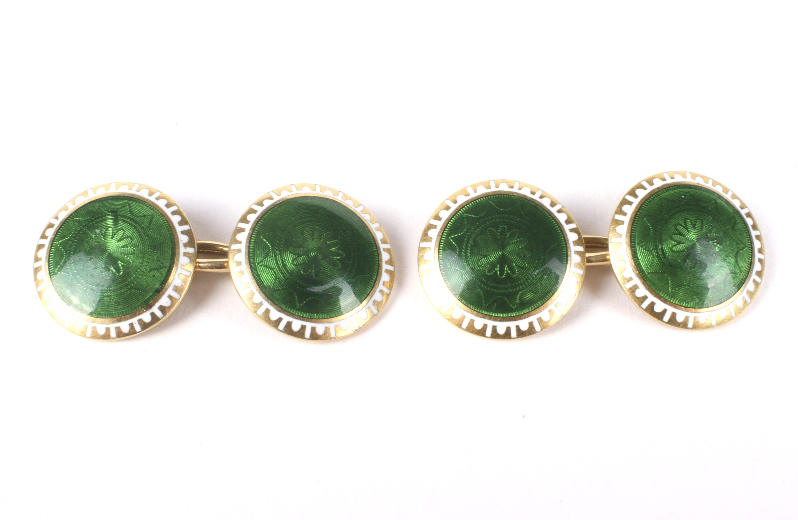 A pair of early 20th century gold and enamel cufflinks.