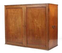 A 19th century inlaid mahogany press cupboard with twin carrying handles.