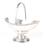 A silver Regency style swing handled bon bon dish.