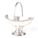 A silver Regency style swing handled bon bon dish.