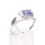 A modern 9ct white gold, tanzanite and diamond dress ring.