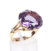 A vintage synthetic-corundum (imitating alexandrite) single stone ring.