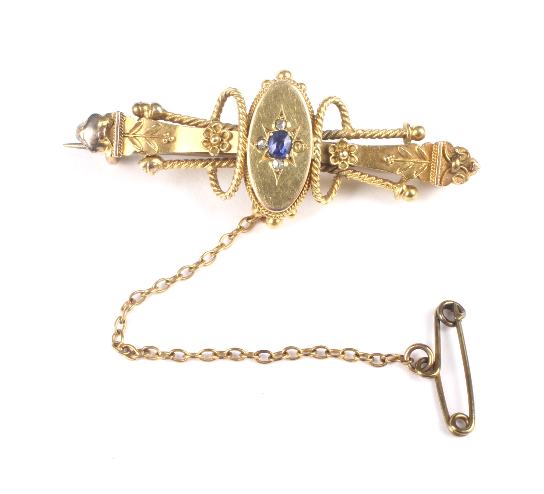 A late Victorian gold, sapphire and diamond brooch.