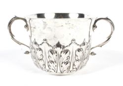 A fine silver twin handled cup.