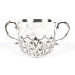 A fine silver twin handled cup.