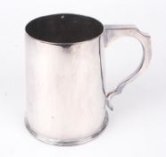 A Mappin & Webb silver plated tankard with inscription.