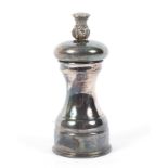 A silver pepper grinder with thistle finial. Maker Sidney Beddall, Sheffield 1968. Weight 162 grams.