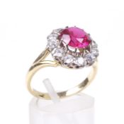 A synthetic-ruby and near-colourless sapphire cluster ring.