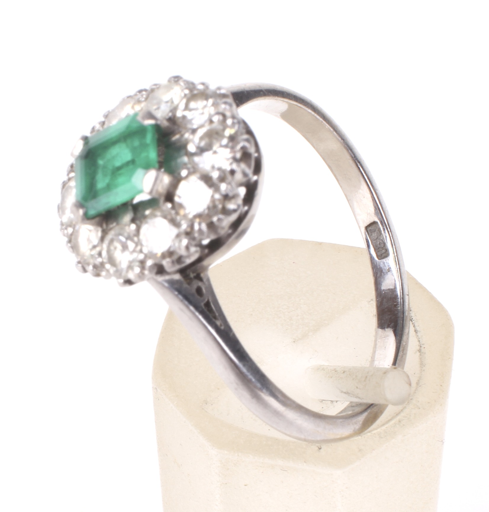 A mid 20th century white gold, emerald and diamond oval cluster ring. - Image 4 of 4