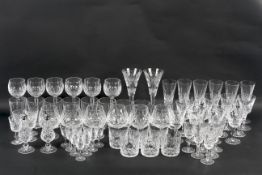 An extensive collection of Waterford crystal drinking glasses.