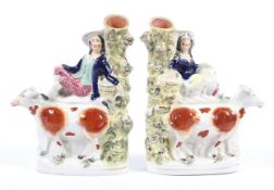 A pair of 19th century Staffordshire flatback spill vases.