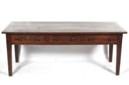 A good quality 19th century oak plank top three drawer refrectory tableTable with three drawers.