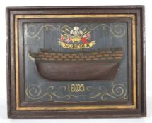 A framed Folk Art protracting model of a galleon hull.