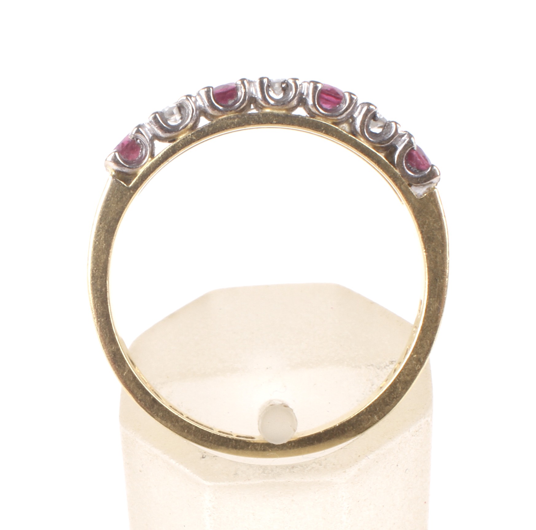 A vintage 18ct gold, ruby and diamond seven stone half-eternity ring. - Image 3 of 4