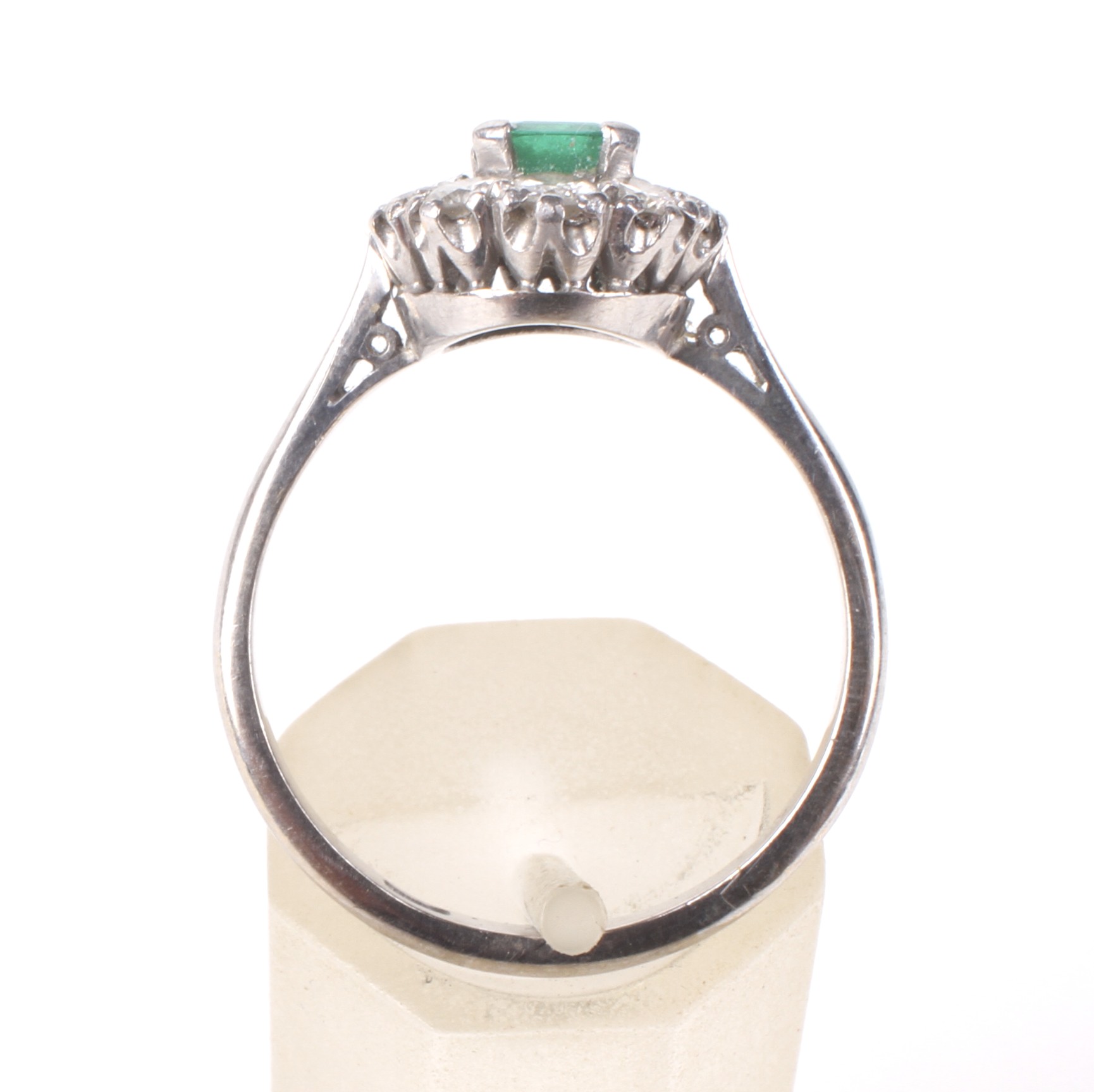 A mid 20th century white gold, emerald and diamond oval cluster ring. - Image 3 of 4