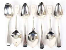 Eight Georgian silver desert spoons.