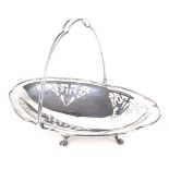 An early 20th century silver swing handled dish.
