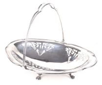 An early 20th century silver swing handled dish.