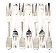 Seven silver dinner forks.