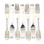 Seven silver dinner forks.