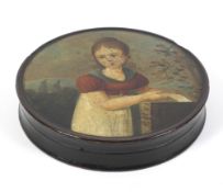 An early 19th century lacquered papier mache circular snuff box.