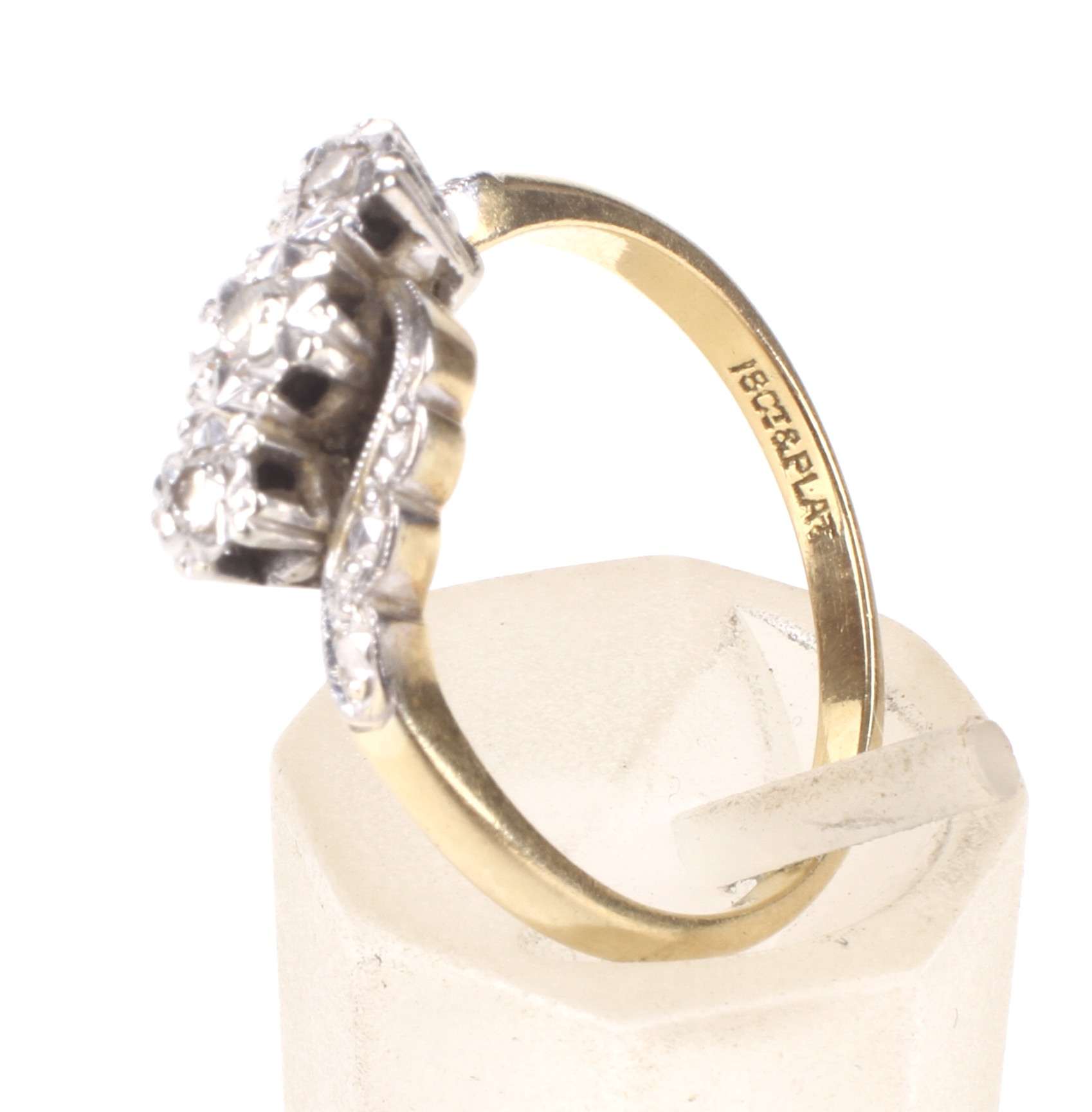 A mid 20th century gold and diamond three stone cross-over ring. - Image 4 of 4