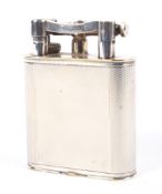 An early 20th century Dunhill silver-plated table lighter.