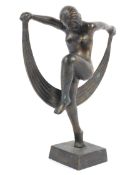 An Art Deco style bronze nude dancer.