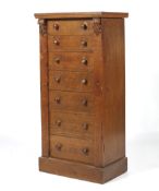 An oak Wellington chest.