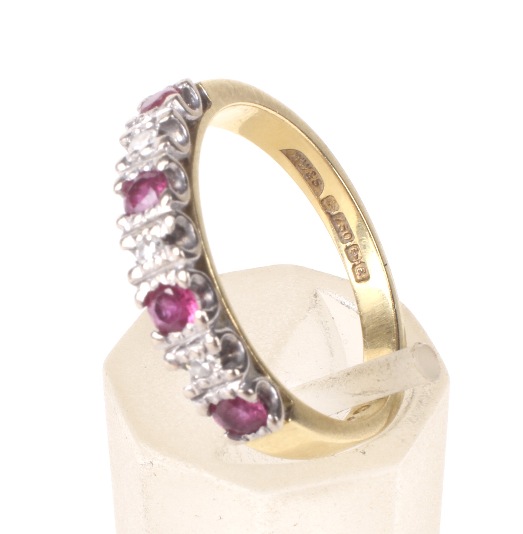 A vintage 18ct gold, ruby and diamond seven stone half-eternity ring. - Image 4 of 4