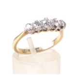 A mid 20th century gold and diamond five stone ring. The graduated old-cut stones approx. 0.