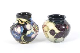 Two Moorcroft Pottery small oviform vases.
