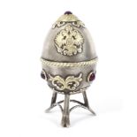 A Russian Imperial silver egg.