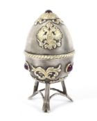 A Russian Imperial silver egg.