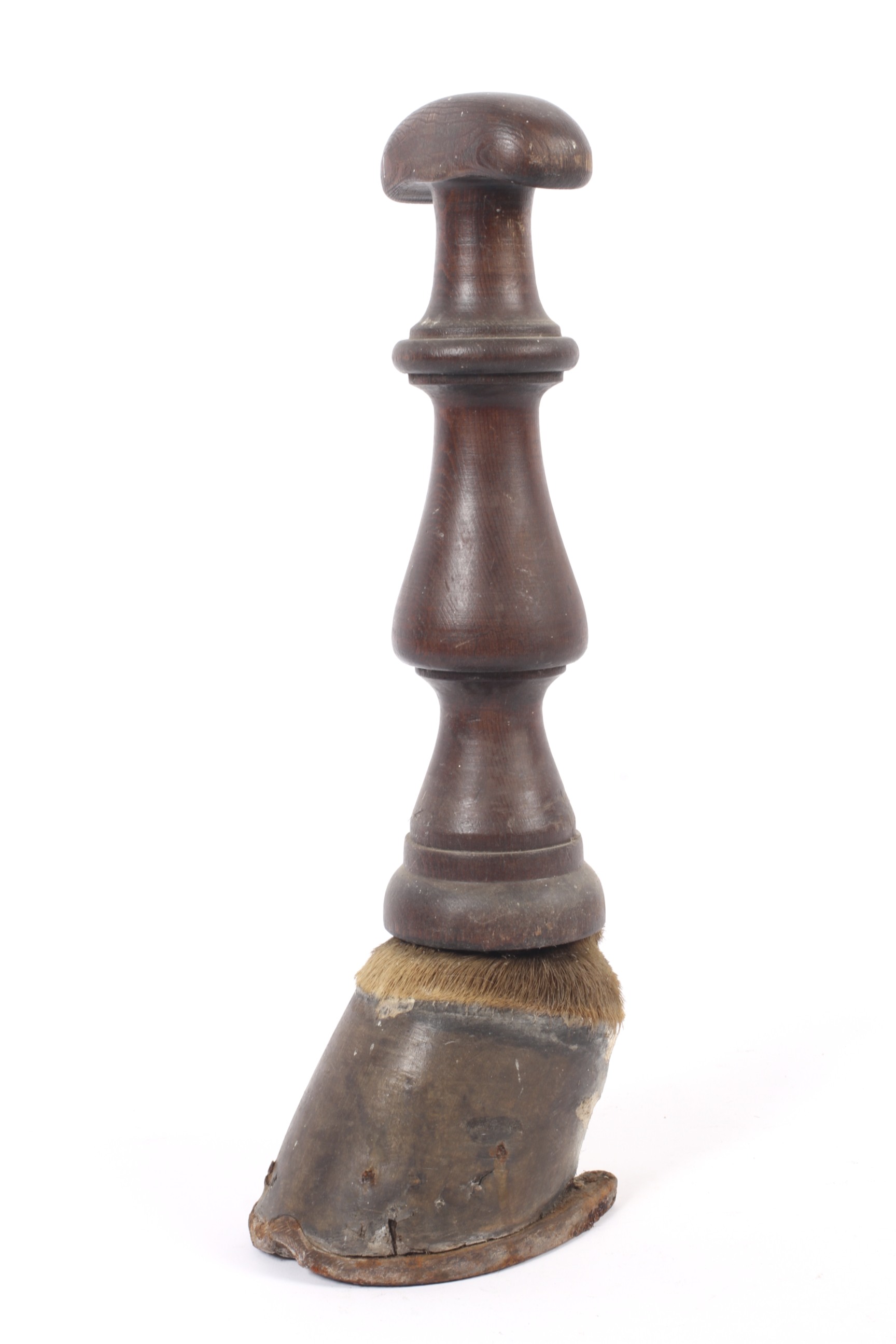 An 19th century mahogany door stop.