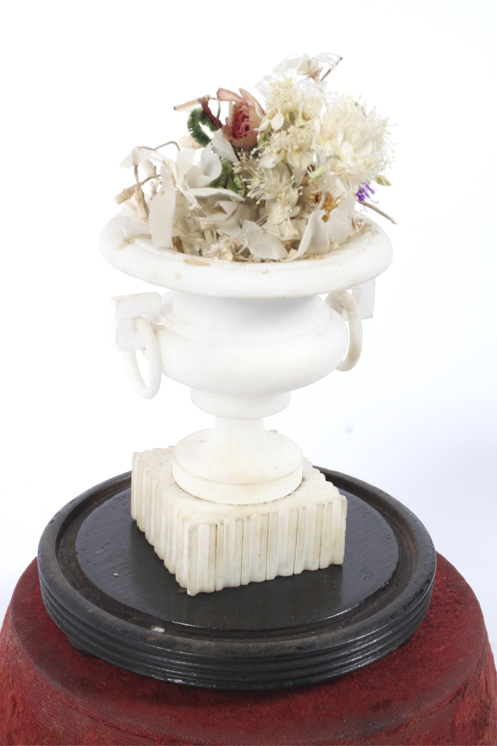 A Victorian carved alabaster urn filled with fabric flowers, under a glass dome. - Image 2 of 2