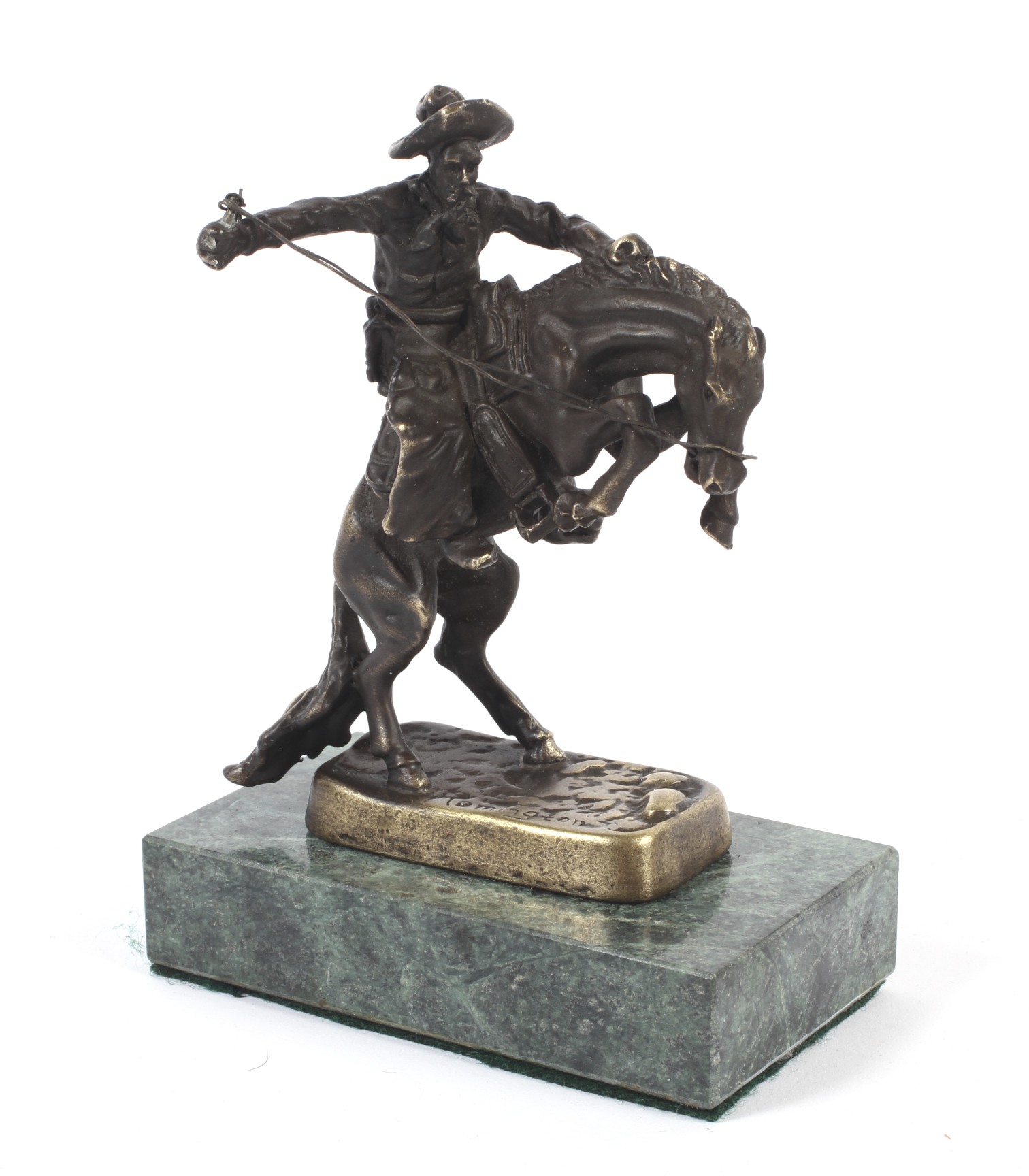 After Frederick Remington (1861-1909), a bronze cowboy riding a Mustang horse.