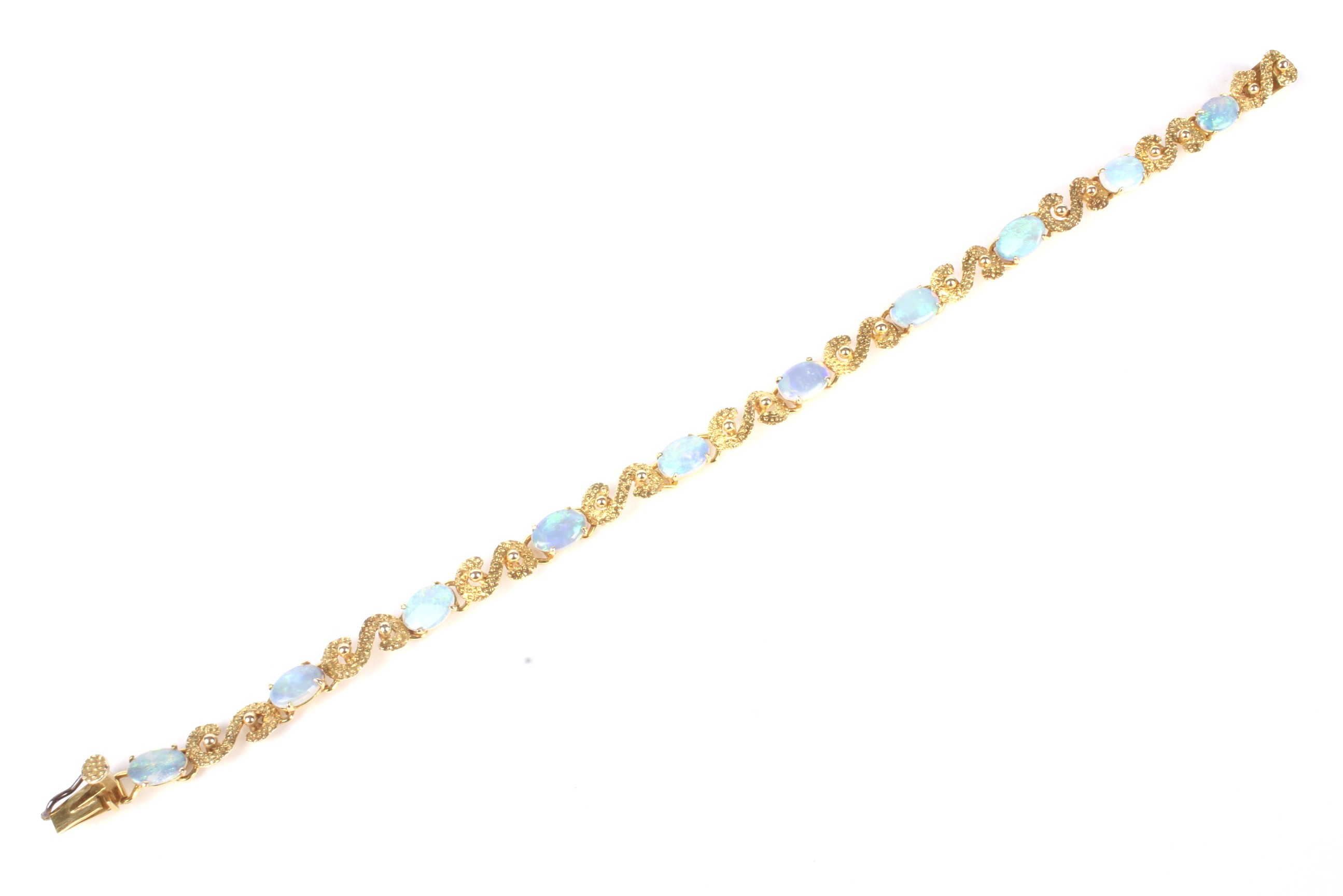 A vintage far eastern white opal bracelet.