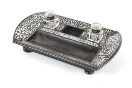 A Victorian ebony mother of pearl inlaid dual inkwell desk stand.