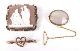 Three Victorian and later gold brooches.