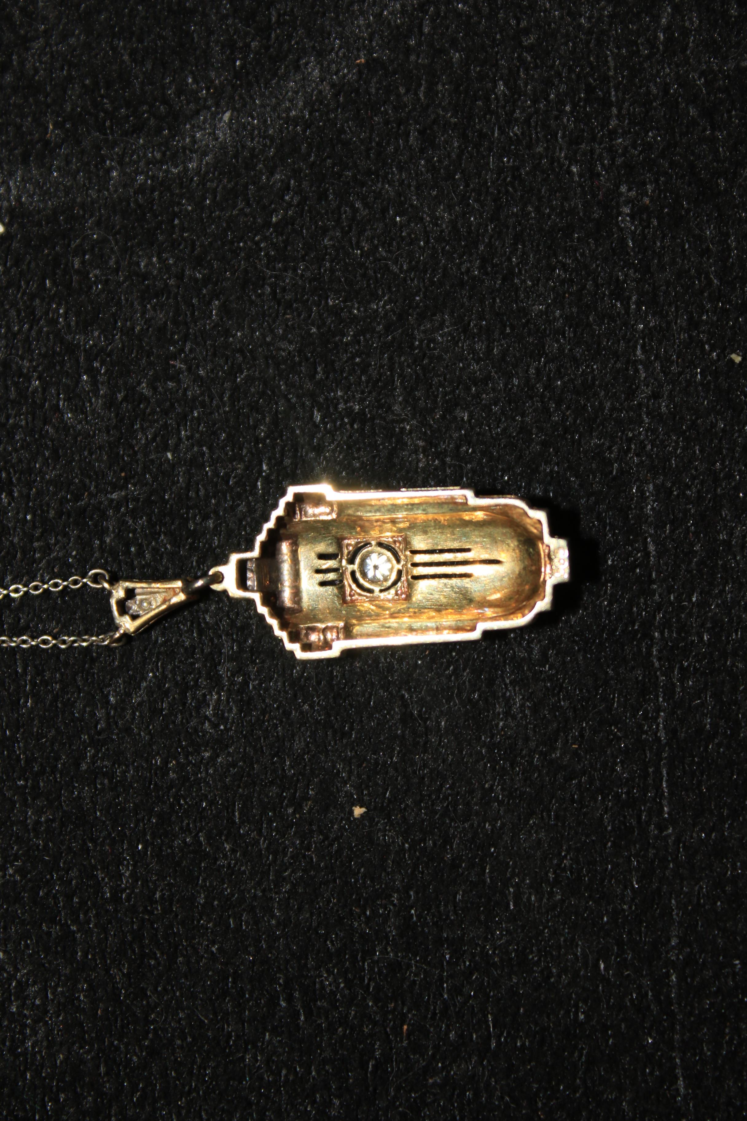 An Odeonesque gold and diamond pendant necklace, circa 1940. - Image 3 of 4