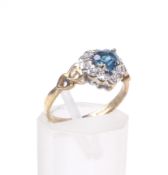 A 9ct gold, treated blue topaz and diamond heart-shaped cluster ring.