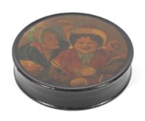 A 19th century lacquered papier mache circular snuff box.