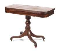 A George III mahogany fold over top tea table on turned column and splayed supports L91cm x D44cm x