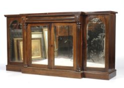 A 19th century rosewood mirrored break front side cabinet.