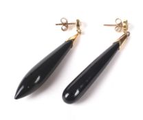 A pair of 15ct gold onyx drop earnings. The clasp set with a seed pearl L5cm, 7.