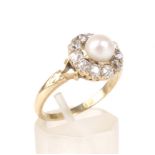 A late Victorian gold, 'pearl' and diamond cluster ring.
