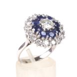 A modern sapphire and diamond flower-head cluster ring.